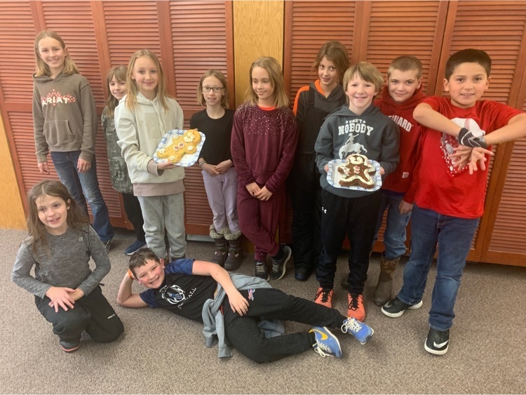 Spanish students celebrate finding the gingerbread man.